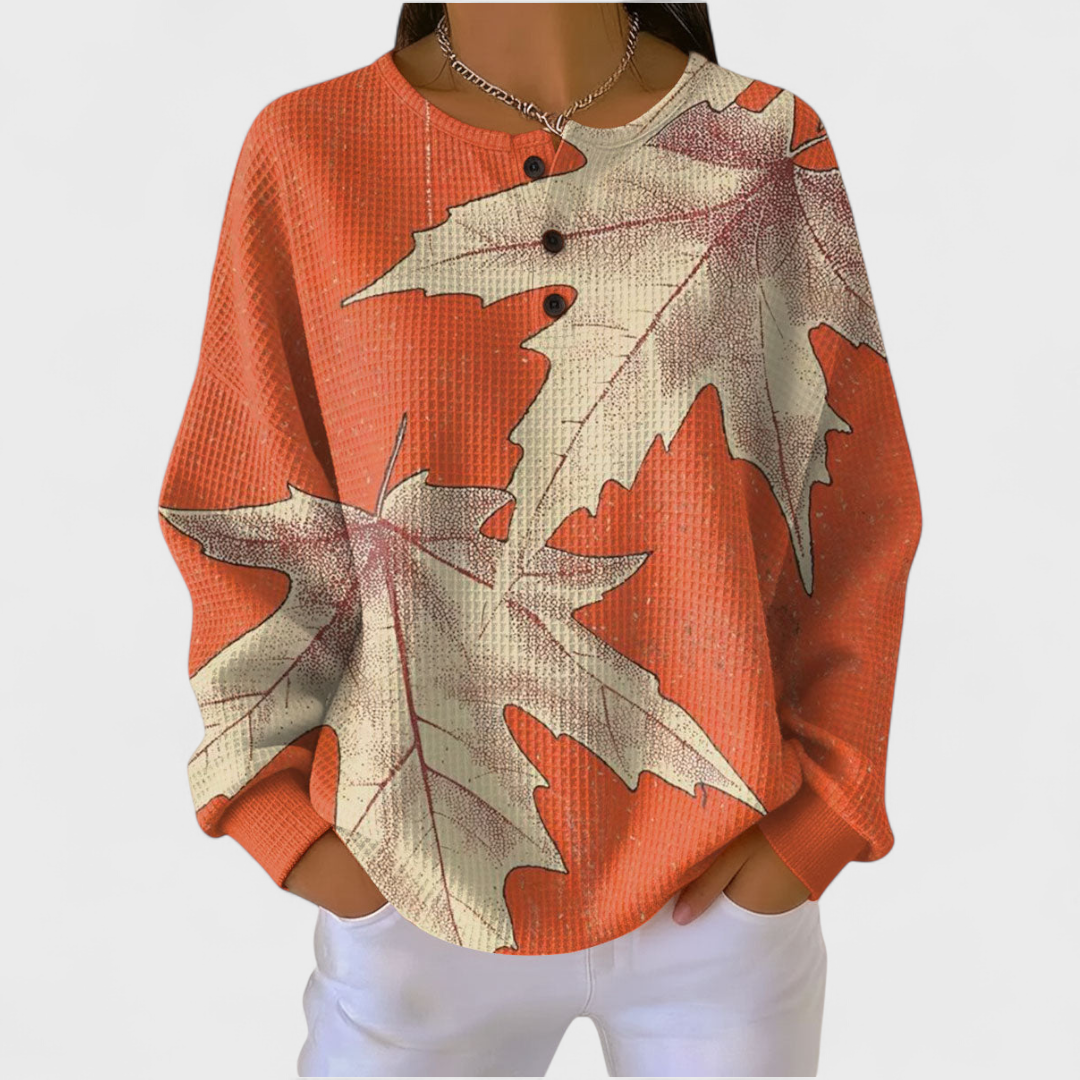 Marit | Jersey naranja con estampado 1